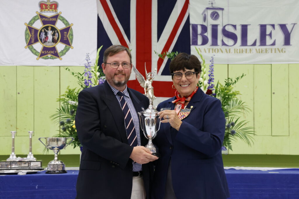 Rob presented the John Booker Cup by Patti Clark, Captain of the USA Rifle Team. Credit: theshorey.com / @theshorey